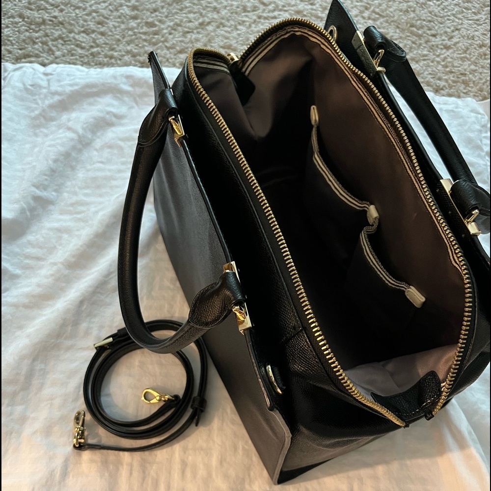 Henri Bendel Tote in excellent used condition.Dust bag and strap inc.
